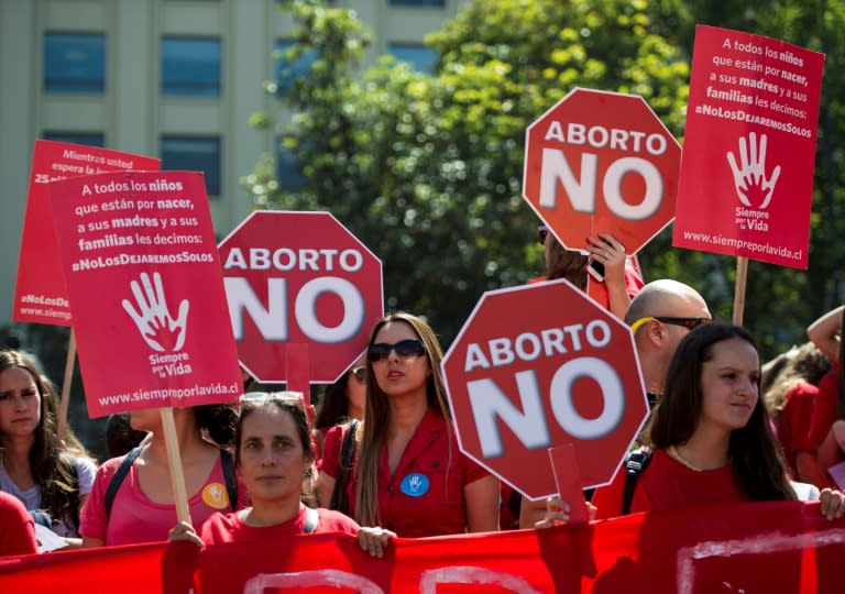 Activists protest against abortion in front of La Moneda presidential palace on March 21, 2016