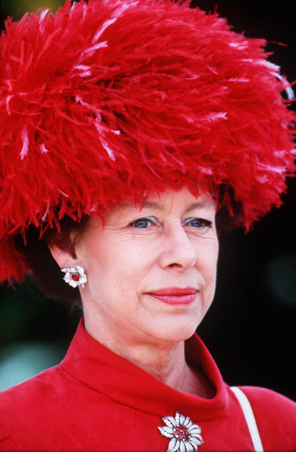 <p>The Princess wears a bold, feathered hat and matching dress to Royal Ascot on June 20, 1991.</p>