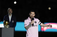 Inter Miami forward Lionel Messi speaks during a ceremony honoring his Ballon d'Or trophy, before the team's club friendly soccer match against New York City FC, Friday, Nov. 10, 2023, in Fort Lauderdale, Fla. (AP Photo/Lynne Sladky)