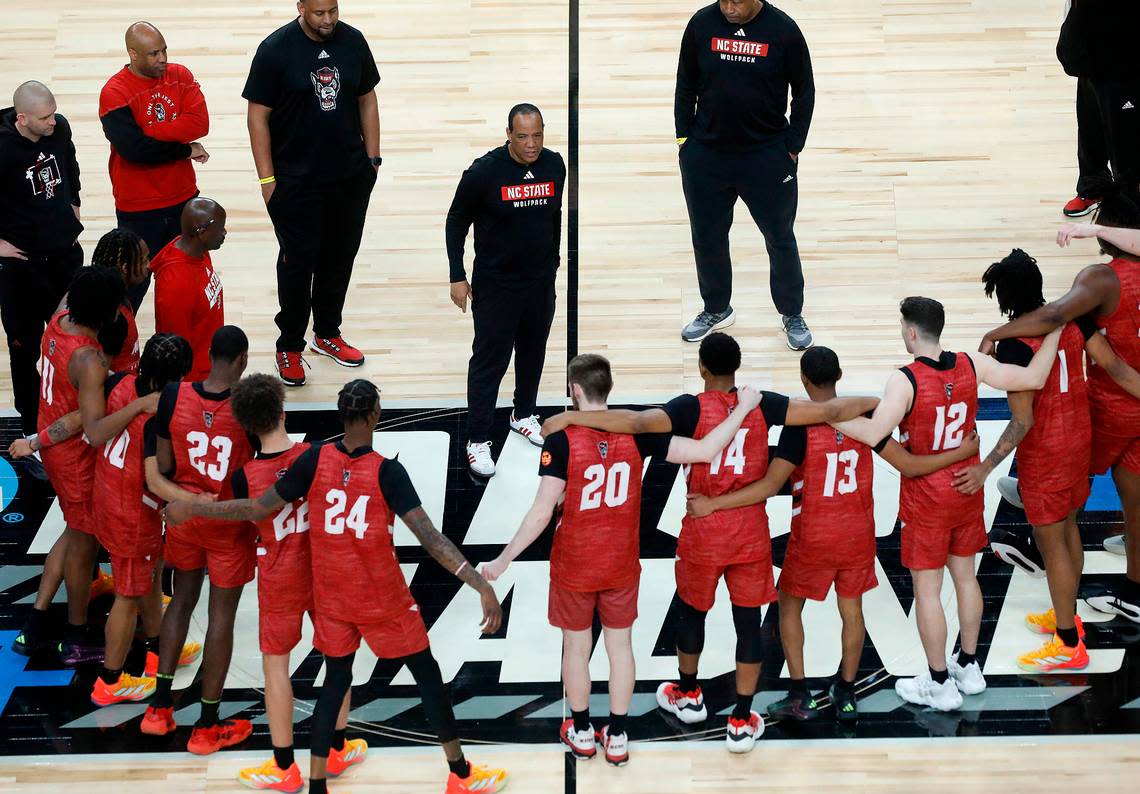 N.C. State head coach Kevin Keatts gathers his team at center court following practice on Wednesday, March 20, 2024, at PPG Paints Arena in Pittsburgh, Pa. The Wolfpack face sixth-seeded Texas Tech in the first round of the NCAA Tournament on Thursday. Kaitlin McKeown/kmckeown@newsobserver.com