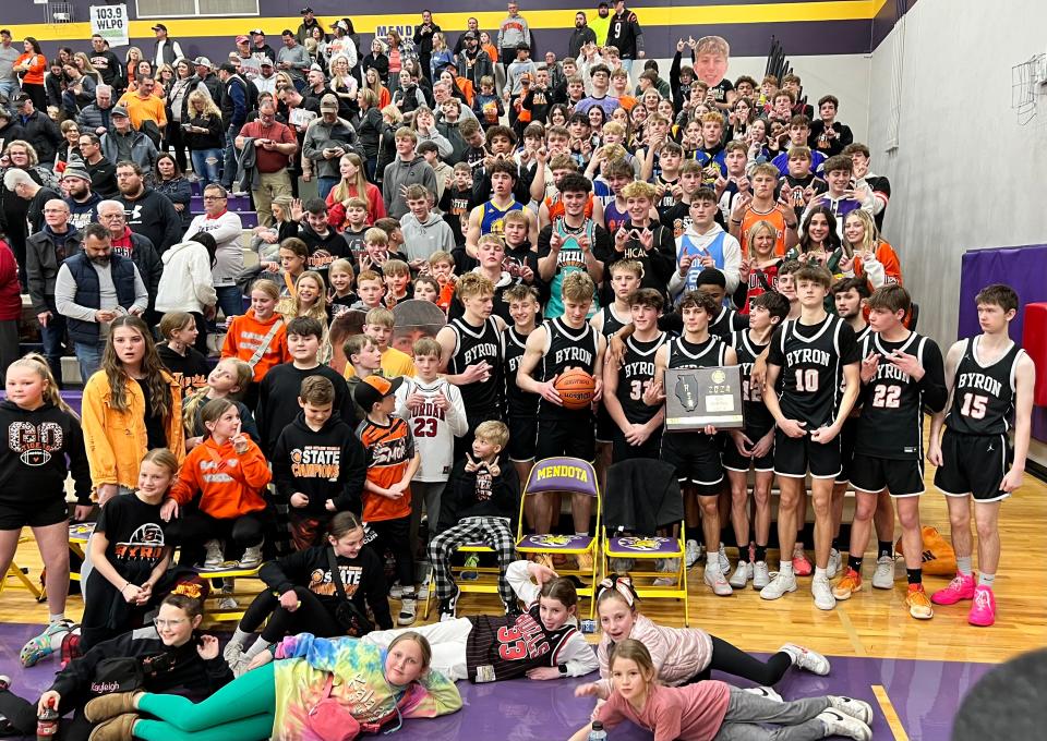 The Byron Tigers celebrate with their fans after winning the Mendota Sectional title with a 58-43 win over Princeton on Friday, March 1, 2024, in Mendota.