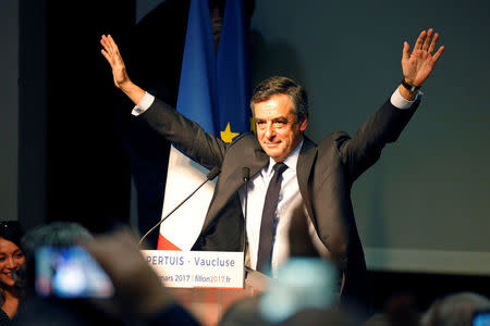 Francois Fillon, former French prime minister, member of the Republicans political party and 2017 presidential election candidate of the French centre-right, waves at supporters during a campaign rally in Pertuis, France, March 15, 2017. REUTERS/Charles Platiau