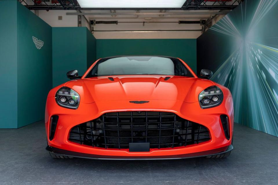 a red sports car in a garage