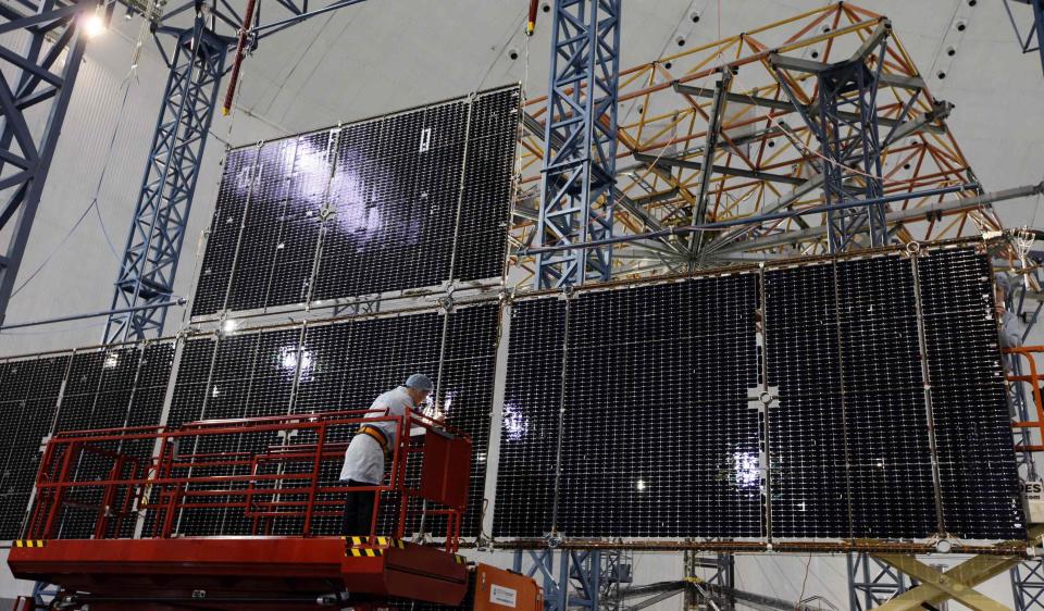 Chief engineer of "Kvant" research and production enterprise, inspects a solar battery for Express AM6 new generation geostationary telecommunications heavy satellite in Zheleznogorsk