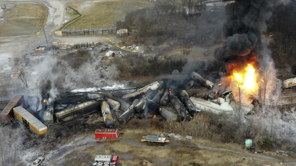 FILE - This photo taken with a drone shows portions of a Norfolk and Southern freight train that derailed the night before in East Palestine, Ohio, on Feb. 4, 2023. The Federal Railroad Administration recently completed a review of Norfolk Southern's safety culture done in the wake of the fiery Feb. 3 derailment in Ohio, and officials plan to follow up with similar investigations of all the major freight railroads over the next year. (AP Photo/Gene J. Puskar, File)