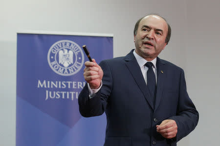 FILE PHOTO: Romanian Justice Minister Tudorel Toader gestures while talking to media representatives minutes before delivering a news conference in Bucharest, Romania, February 22, 2018. Inquam Photos/Octav Ganea via REUTERS