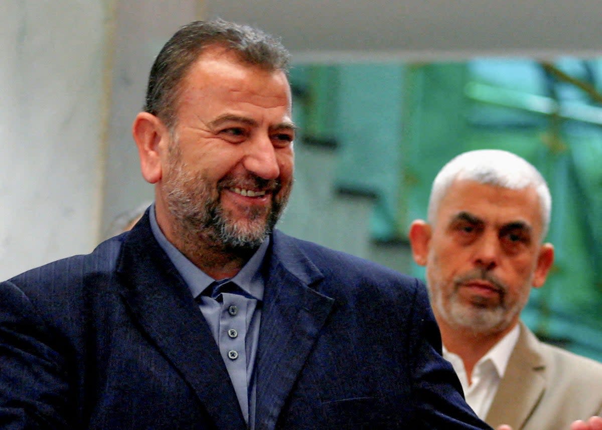 Arouri with IDF's most wanted man in Gaza, Hamas leader Yahya Sinwar  (REUTERS)