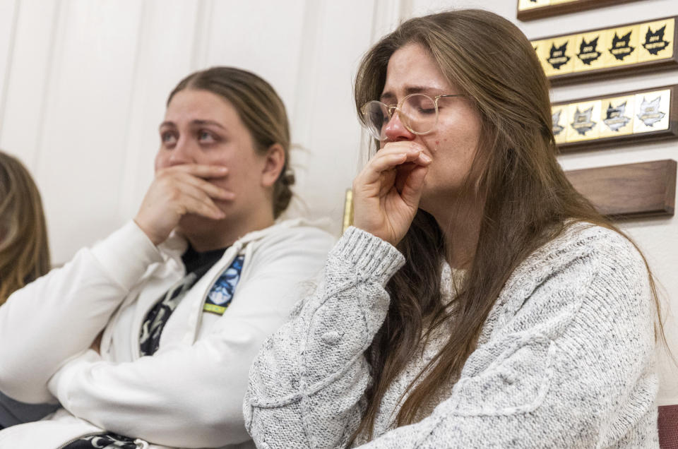 Jess, left, sits next to her sister, Cecily, during a press conference regarding the killing of a family in Enoch, Utah on Thursday, Jan. 5, 2023. A Utah man fatally shot his five children, his mother-in-law and his wife, then killed himself two weeks after the woman had filed for divorce, according to authorities and public records.(Ben B. Braun/The Deseret News via AP)