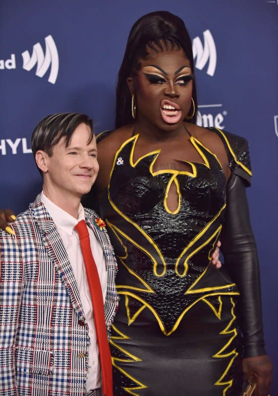 Bob the Drag Queen (R) and John Cameron Mitchell arrive on the red carpet for the 33rd Annual GLAAD Media Awards at the Beverly Hilton in California on April 2, 2022. Mitchell turns 61 on April 21. File Photo by Chris Chew/UPI