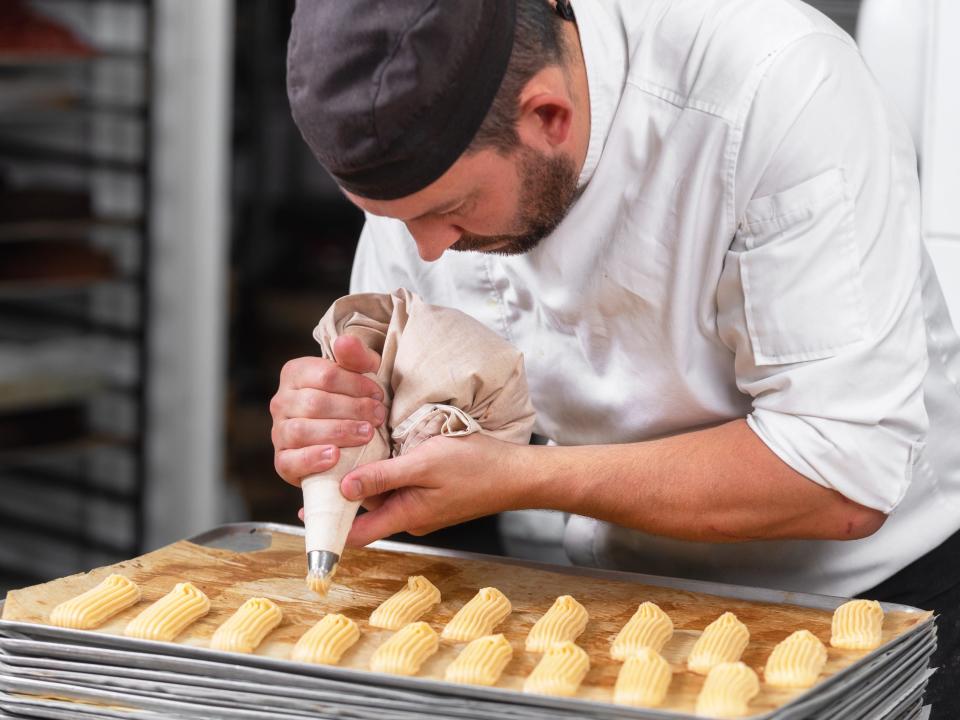 pastry chef working bakery