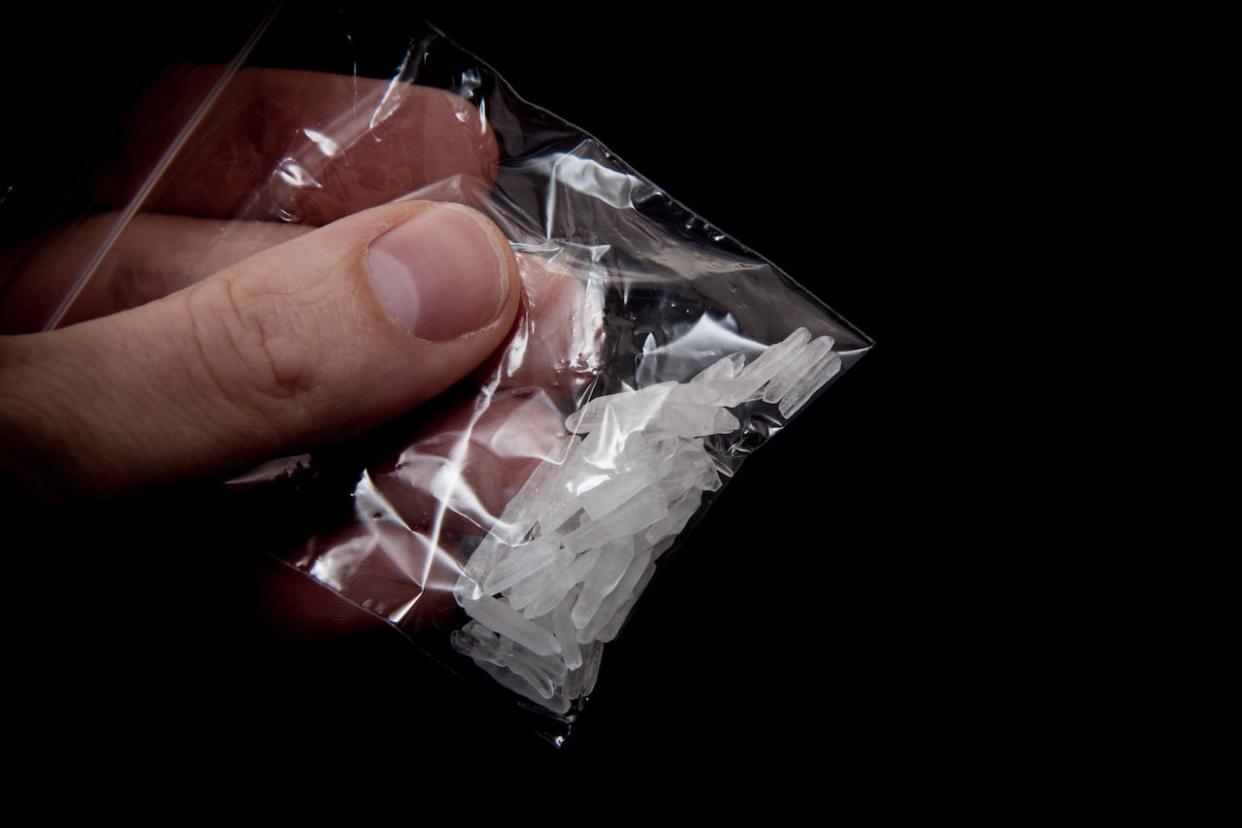 A bag of methamphetamine, also known as crystal meth, is shown in this stock image. A fatality inquiry was called to investigate the death of an Edmonton infant from meth poisoning.  (Kaesler Media/Shutterstock - image credit)
