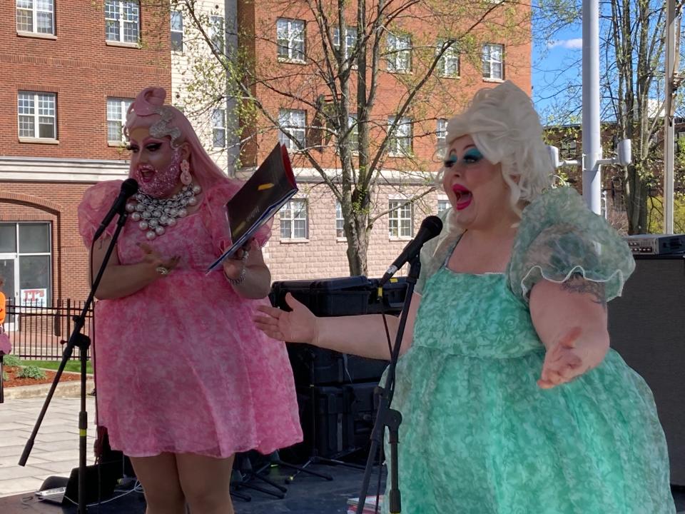 Emoji Nightmare, left, and Katniss Everqueer perform Drag Queen Story Hour at the Waking Windows festival in Winooski on May 6, 2023.