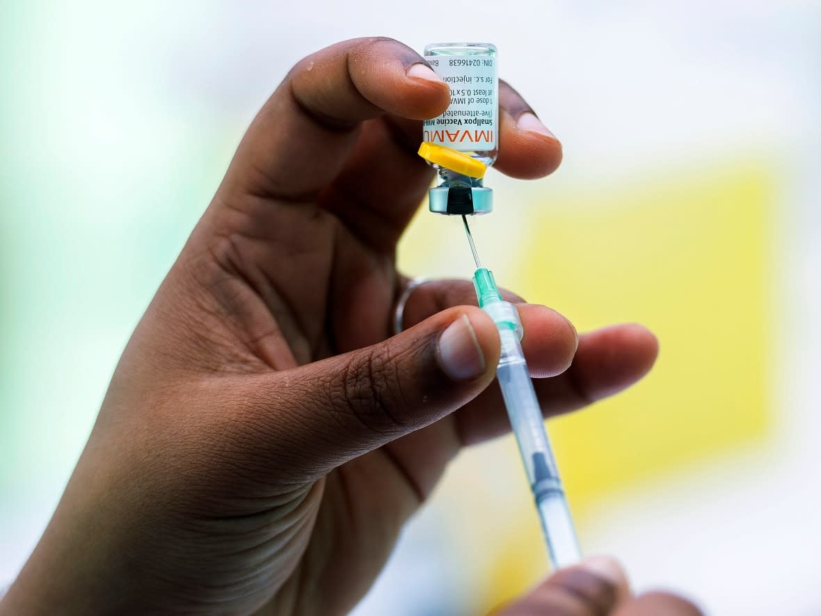 A health-care worker prepares a monkeypox vaccine in Montreal on Saturday, July 23, 2022. (Graham Hughes/The Canadian Press - image credit)