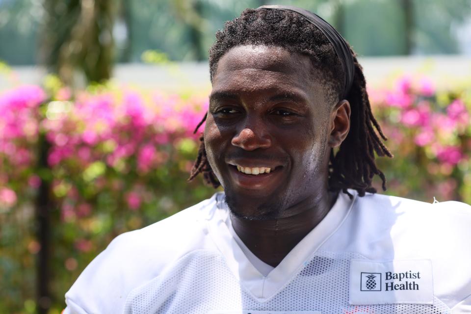 Jun 5, 2024; Miami Gardens, FL, USA; Miami Dolphins tackle Patrick Paul (52) speaks to reporters during mandatory minicamp at Baptist Health Training Complex. Mandatory Credit: Sam Navarro-USA TODAY Sports