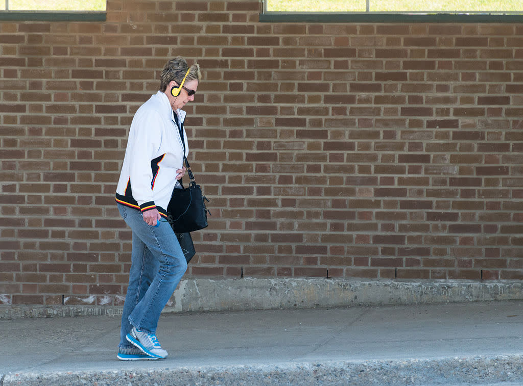 Social disconnection: Woman wearing headphones and