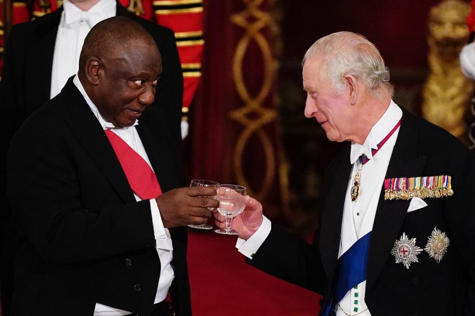 President Cyril Ramaphosa of South Africa and King Charles III toast during the State Banquet at Buckingham Palace on November 22, 2022.