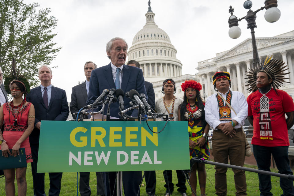 Sen. Ed Markey, D-Mass., chairman of the Senate Climate Change Task Force, joined at left by Sen. Chris Van Hollen, D-Md., Sen. Jeff Merkley, D-Ore., and indigenous people of the Americas, at a news conference at the Capitol in Washington, Tuesday, Sept. 17, 2019. (AP Photo/J. Scott Applewhite)