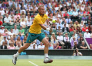 LONDON, ENGLAND - AUGUST 01: Lleyton Hewitt of Australia plays a forehand to Novak Djokovic of Serbia during the third round of Men's Singles Tennis on Day 5 of the London 2012 Olympic Games at Wimbledon on August 1, 2012 in London, England. (Photo by Clive Brunskill/Getty Images)