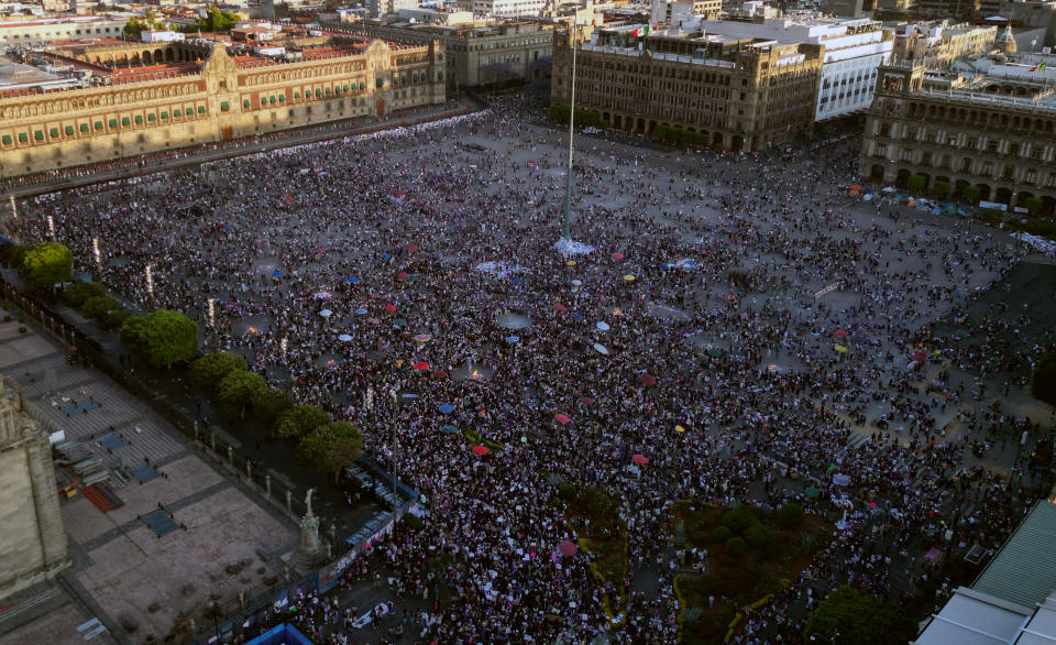 Aerial view showing demonstrators gathering at Zocalo square to commemorate International Women's Day, in Mexico City on March 8, 2024. People around the world marked International Women's Day Friday with protests and celebrations. (Photo by Alfredo ESTRELLA / AFP) (Photo by ALFREDO ESTRELLA/AFP via Getty Images)