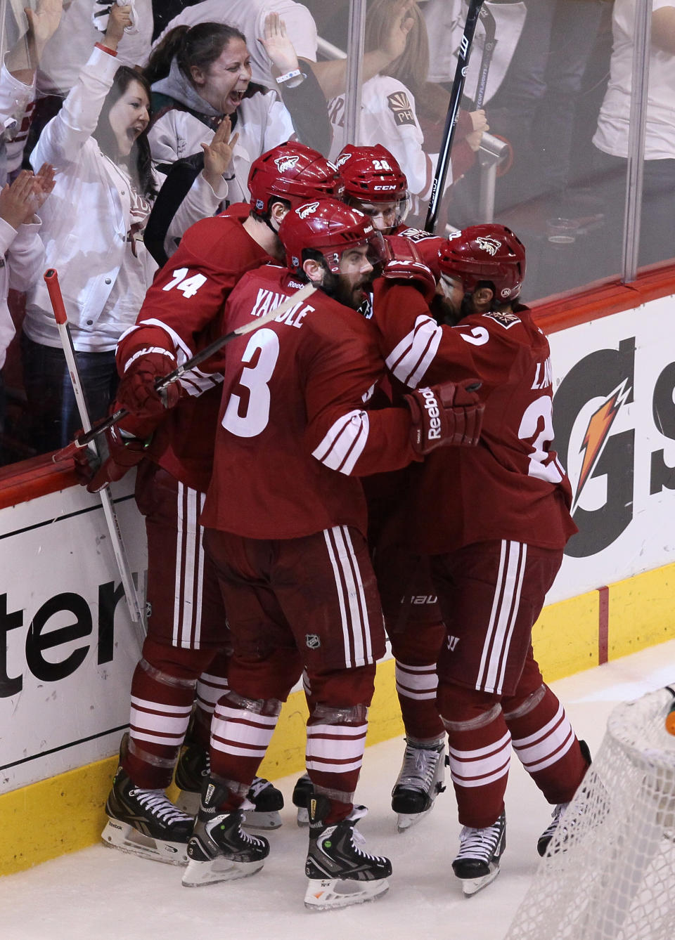 GLENDALE, AZ - MAY 22: Keith Yandle #3 of the Phoenix Coyotes celebrates his second period goal with teammates Daymond Langkow #22 and Taylor Pyatt #14 past goaltender Jonathan Quick #32 of the Los Angeles Kings in Game Five of the Western Conference Final during the 2012 NHL Stanley Cup Playoffs at Jobing.com Arena on May 22, 2012 in Phoenix, Arizona. (Photo by Jeff Gross/Getty Images)