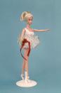 <p>Dressed in a white bodysuit and tutu accented with a red ribbon, Ballerina Barbie became the inspiration for many a ballet class. </p>