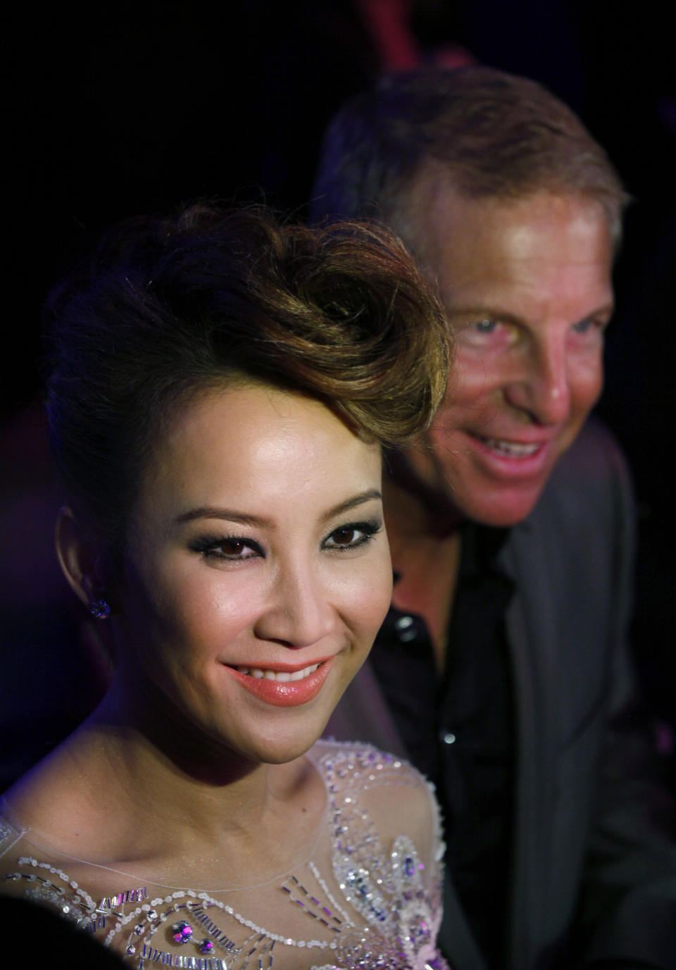 FILE - Hong Kong's pop diva Coco Lee, left, smiles with her husband, Bruce Rockowitz, president of Li & Fung Ltd., during their wedding banquet at Shaw Studio in Hong Kong, China, Friday, Oct. 28, 2011. Coco Lee, a Hong Kong-born singer who had a highly successful career in Asia, died on Wednesday, July 5, 2023. She was 48. (AP Photo/Kin Cheung, File)