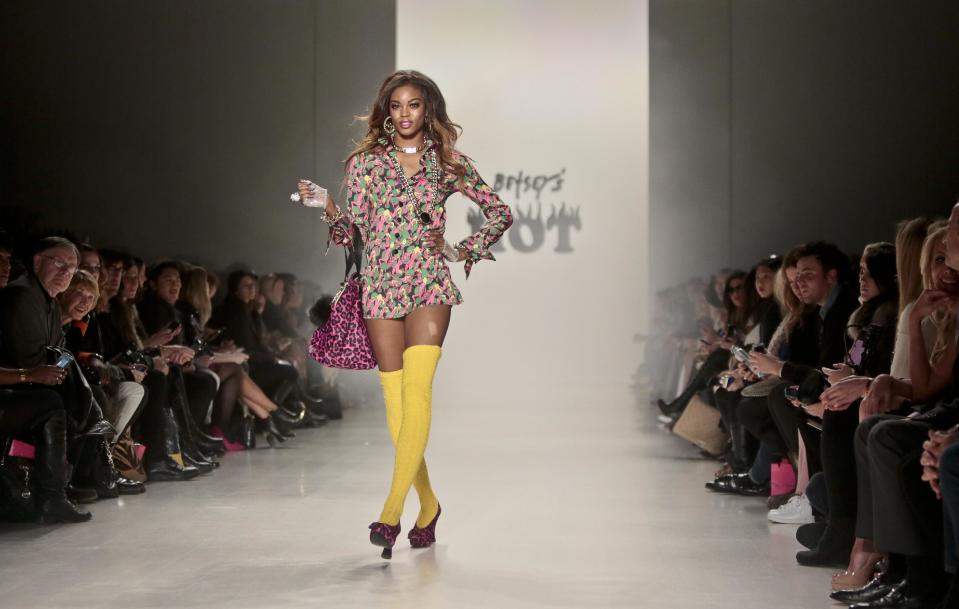 Fashion from the Betsey Johnson Fall 2014 collection is modeled during New York Fashion Week on Wednesday, Feb. 12, 2014. (AP Photo/Bebeto Matthews)