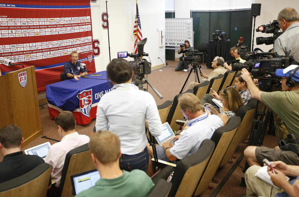 CORRECTS NAME TO KLINSMANN - U.S. Men's National Team Head Coach Jurgen Klinsmann answers questions during a news conference on Wednesday, May 14, 2014, Stanford, Calif. The US national soccer team kicked off its preparation camp at Stanford University preparing for the World Cup tournament, which gets underway in June. (AP Photo/Tony Avelar)