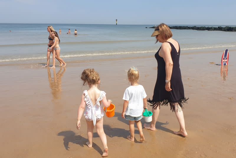 People enjoy a hot summer day on a beach during the coronavirus disease (COVID-19) outbreak, in Knokke-Heist