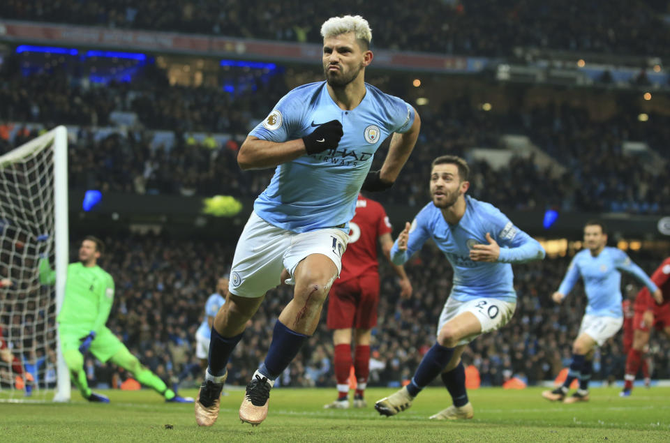 FILE - Manchester City's Sergio Aguero celebrates after scoring the opening goal of the game during their English Premier League soccer match between Manchester City and Liverpool at the Ethiad stadium, Manchester England, Jan. 3, 2019. Barcelona striker Sergio Aguero has on Wednesday, Dec. 15 announced his immediate retirement for health reasons. (AP Photo/Jon Super, file)