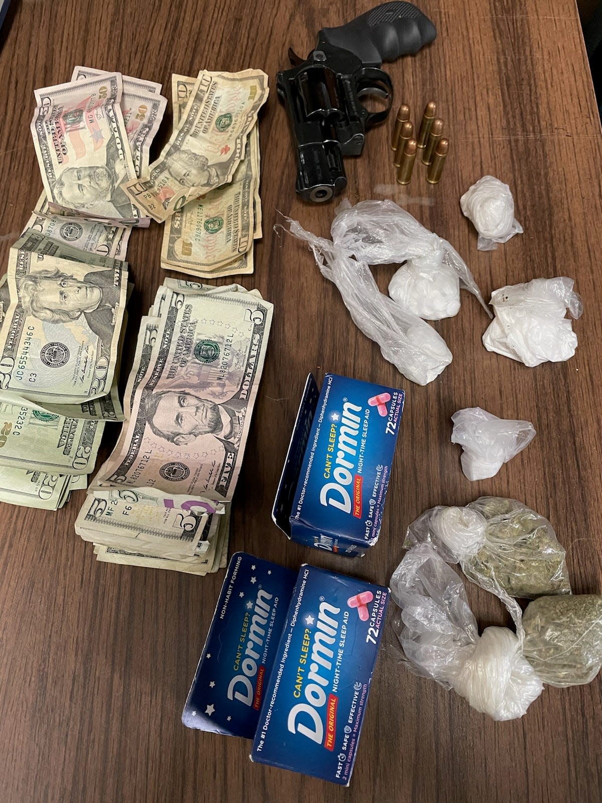 Narcotics, a loaded handgun and cash were confiscated Tuesday when Cedric L. Thompson II was arrested.