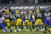 Green Bay Packers kicker Mason Crosby kicks a 39-yard field goal against the Los Angeles Rams during the first half of an NFL divisional playoff football game, Saturday, Jan. 16, 2021, in Green Bay, Wis. (AP Photo/Mike Roemer)