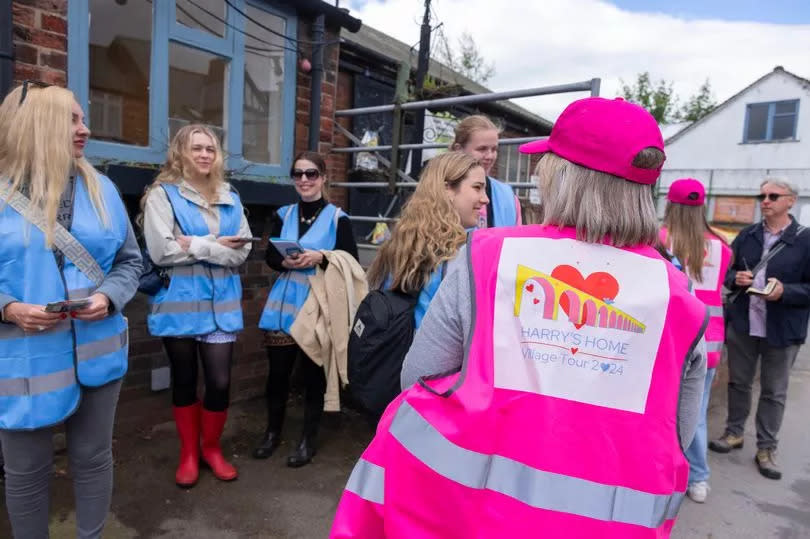 Fans head out on the Harry's Home Village Tour -Credit:Manchester Evening News