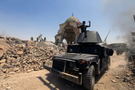 An armoured fighting vehicle of the Counter Terrorism Service is seen at the Grand al-Nuri Mosque at the Old City in Mosul, Iraq, June 30, 2017. REUTERS/Alaa Al-Marjani