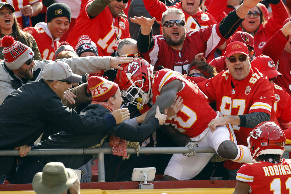 <p>Kansas City Chiefs wide receiver Tyreek Hill (10) celebrates a touchdown against the Arizona Cardinals with fans during the first half of an NFL football game in Kansas City, Mo., Sunday, Nov. 11, 2018. (AP Photo/Charlie Riedel) </p>