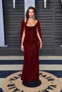 <p>The actor wore a custom-made Zac Posen, burgundy red gown. </p>