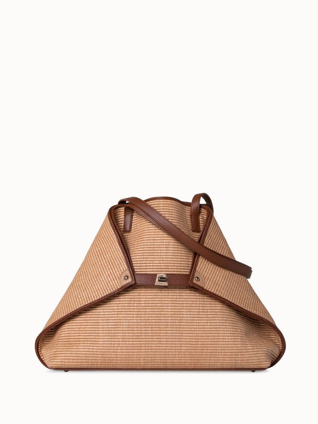 <p><a href="https://us.akris.com/products/medium-raffia-handbag-with-leather-trim-camel-caramel" rel="nofollow noopener" target="_blank" data-ylk="slk:Shop Now;elm:context_link;itc:0;sec:content-canvas" class="link rapid-noclick-resp">Shop Now</a></p><p>Medium Ai Shoulder Bag in Raffia with Leather Trim</p><p>$1790.00</p><p>akris.com</p><span class="copyright">Akris</span>