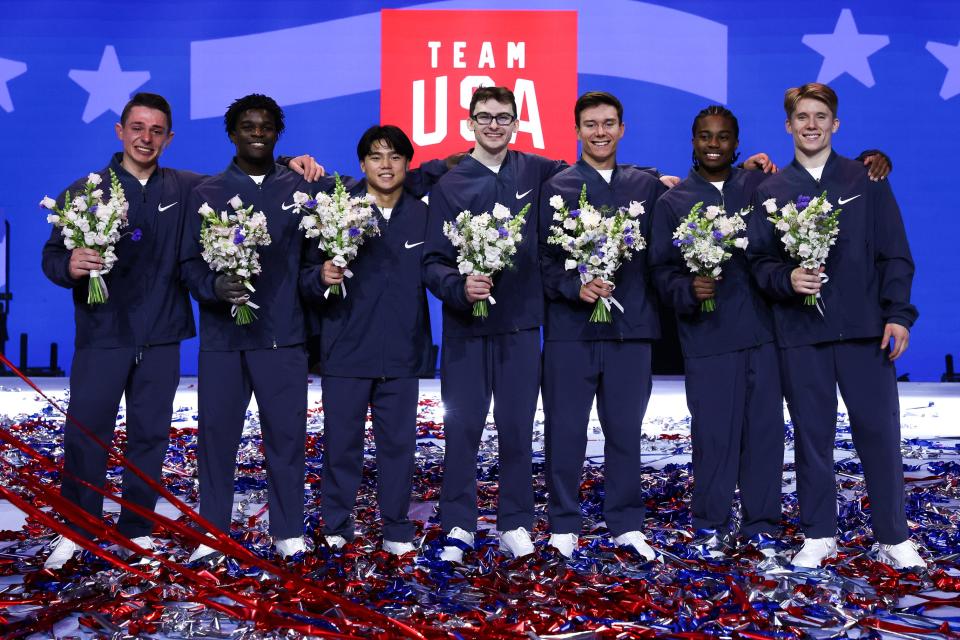 Paul Juda, Frederick Richard, Asher Hong, Stephen Nedoroscik, Brody Malone, Khoi Young and Shane Wiskus pose after being selected 2024 U.S. Olympic men's gymnastics team.