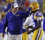 LSU coach Les Miles talks with kicker Cameron Gamble (36) in the second half of an NCAA college football game against New Mexico State in Baton Rouge, La., Saturday, Sept. 27, 2014. LSU won 63-7. (AP Photo/Gerald Herbert)