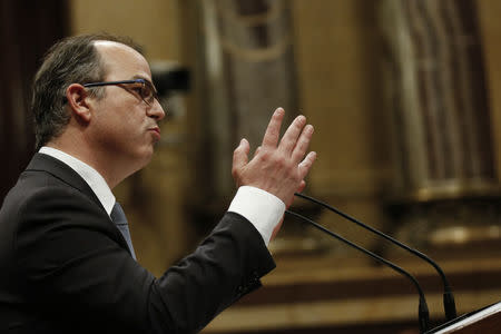 Catalan regional deputy Jordi Turull speaks during his investiture session as new Catalan President at regional parliament in Barcelona, Spain, March 22, 2018. REUTERS/Albert Gea