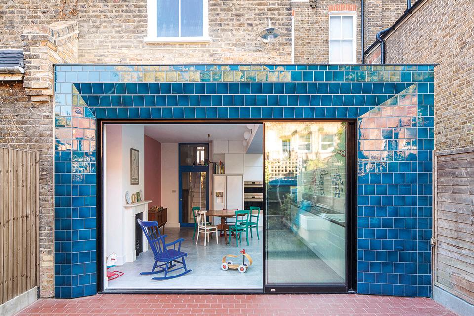 An outdoor space with glazed tiles on the exterior walls