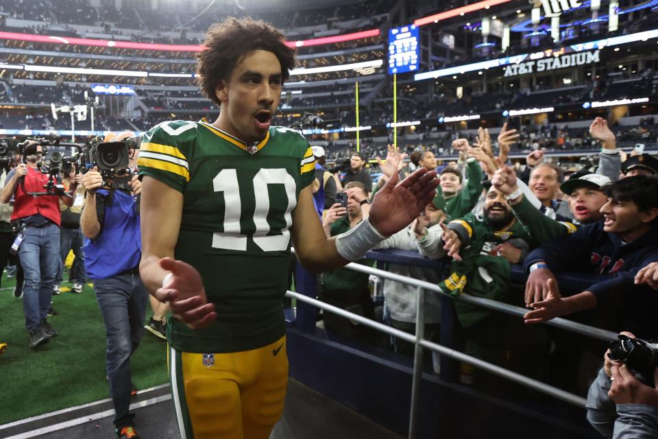 Green Bay Packers quarterback Jordan Love (10) reacts after defeating the Dallas Cowboys in the 2024 NFC wild card game at AT&T Stadium.