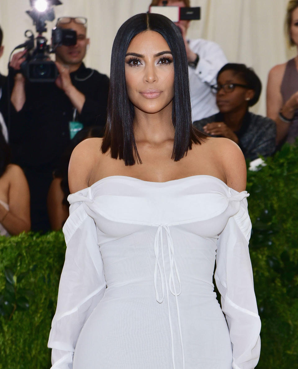 KIM ATTENDS THE MET GALA SOLO