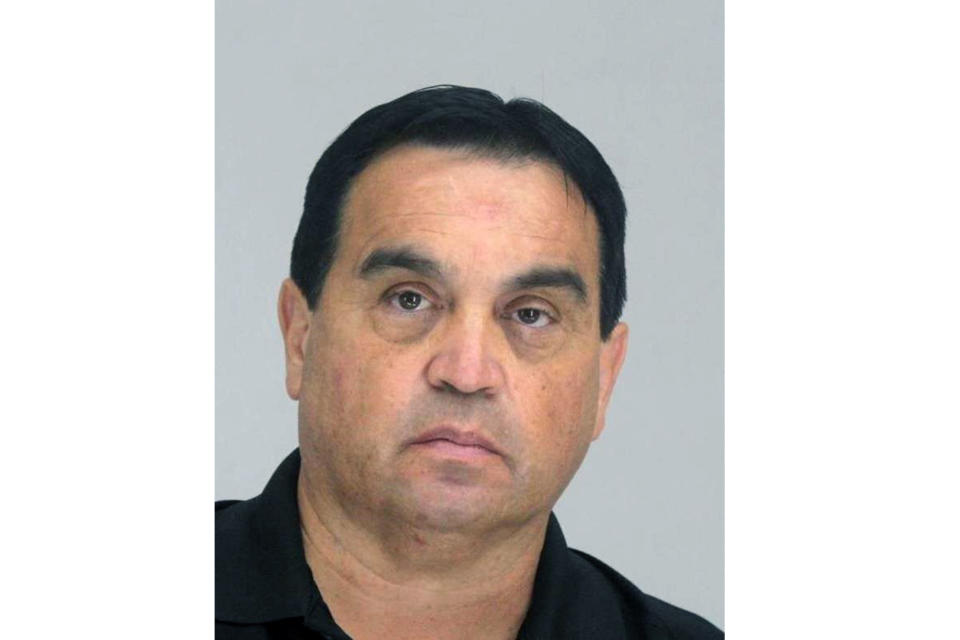 FILE - This photo provided by the Dallas Police Department shows Dr. Raynaldo Rivera Ortiz. Jr. Dr. Raynaldo Rivera Ortiz Jr. a Dallas anesthesiologist was arrested Wednesday, Sept. 14, 2022 after federal investigators accused him of tampering with patients' bags of intravenous fluids. Federal prosecutors say Ortiz Jr. has been convicted for injecting a nerve-blocking agent and other drugs into bags of intravenous fluid at a surgical center where he worked, which led to the death of a co-worker and caused cardiac emergencies for several patients. (Dallas Police Department via AP, File)