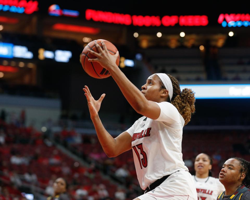 Louisville’s Merissah Russell scores against Boston College on Thursday night.