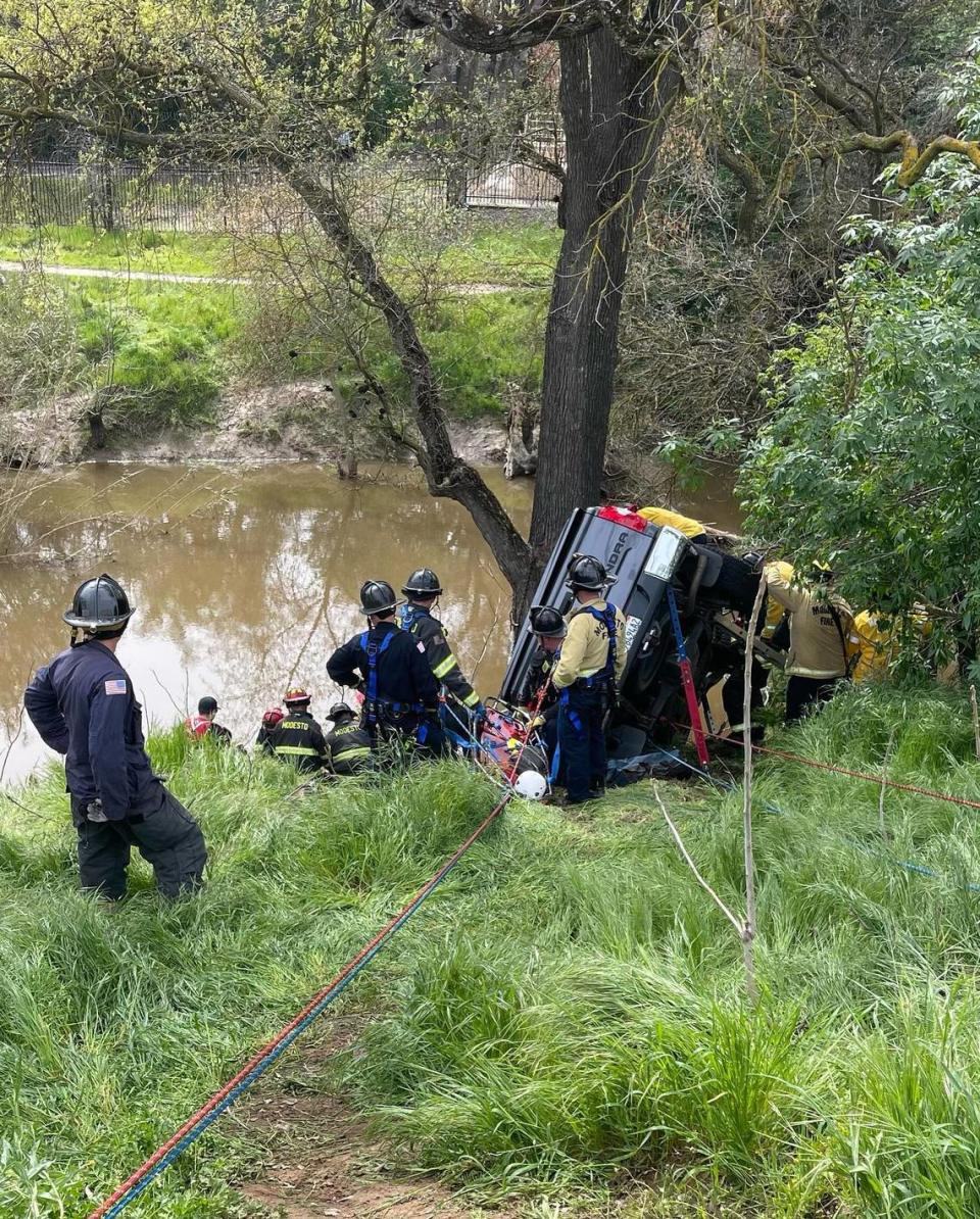 A crash down the Dry Creek embankment along Scenic Drive near Coffee Road in Modesto killed one woman and badly injured another Saturday morning, March 18, 2023.