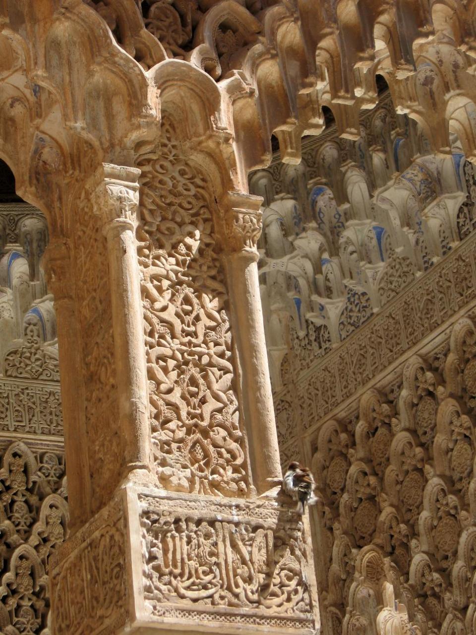 This May 28, 2013 photo taken in Granada in Andalusia, Spain, shows a bird resting inside Palacios Nazaries, the centerpiece of the city’s Alhambra medieval Islamic complex, lushly decorated with carvings. Andalusia offers a fusion of Christian and Islamic cultures, found in architectural masterpieces and in everyday life. (AP Photo/Giovanna Dell’Orto)