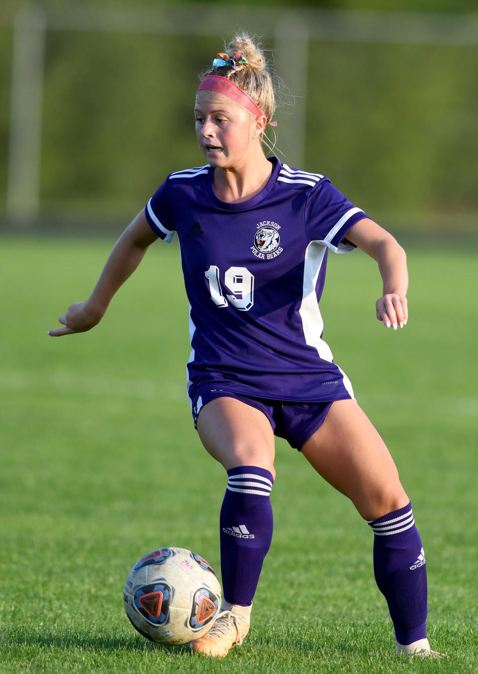 Jackon's Addison Niemi sets up a play during Thursday's match against Srow.