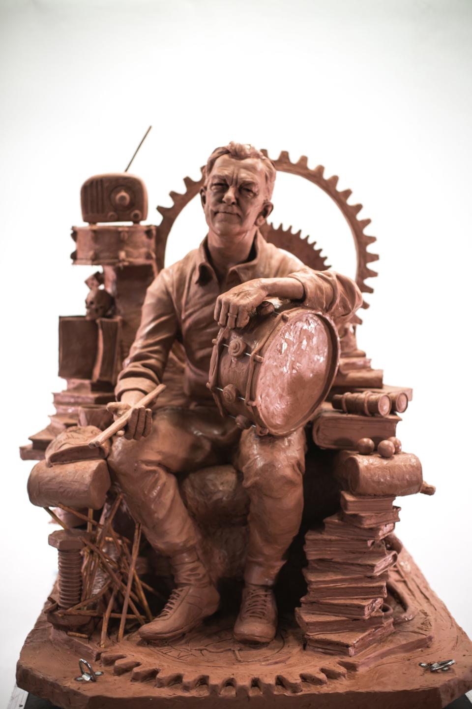 Neil Peart bronze statues 2