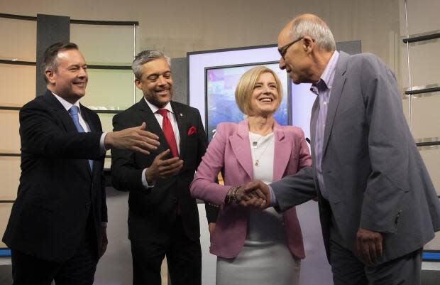 Alberta Liberal Party leader David Khan, 2nd from left, and Alberta Party leader Stephen Mandel, at right, greet their opponents at the 2019 Alberta Leaders Debate in Edmonton. Both Khan and Mandel stepped down from their parties' helms after failing to win any seats in the ensuing election. 